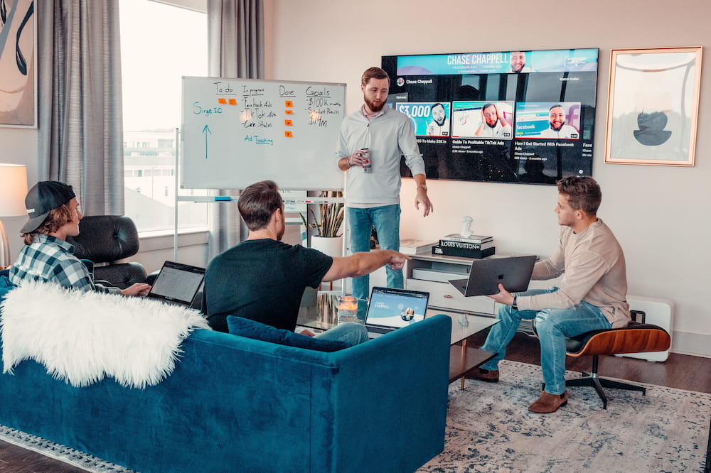 A presentation in a comfortable space to highlight The Key Benefits Of Joining A Mastermind Group