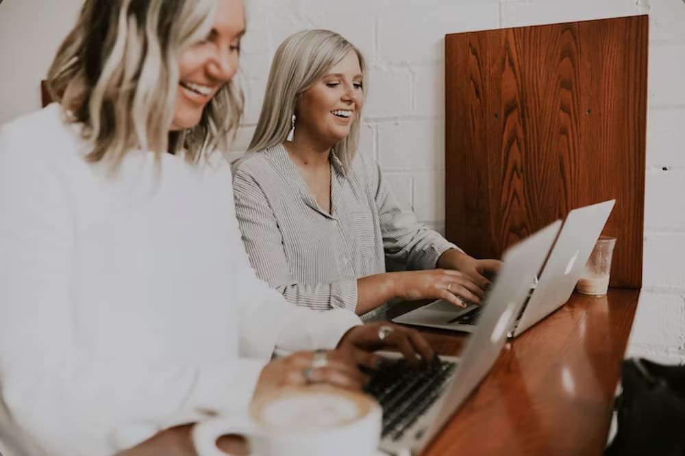An image of a business coach with her client